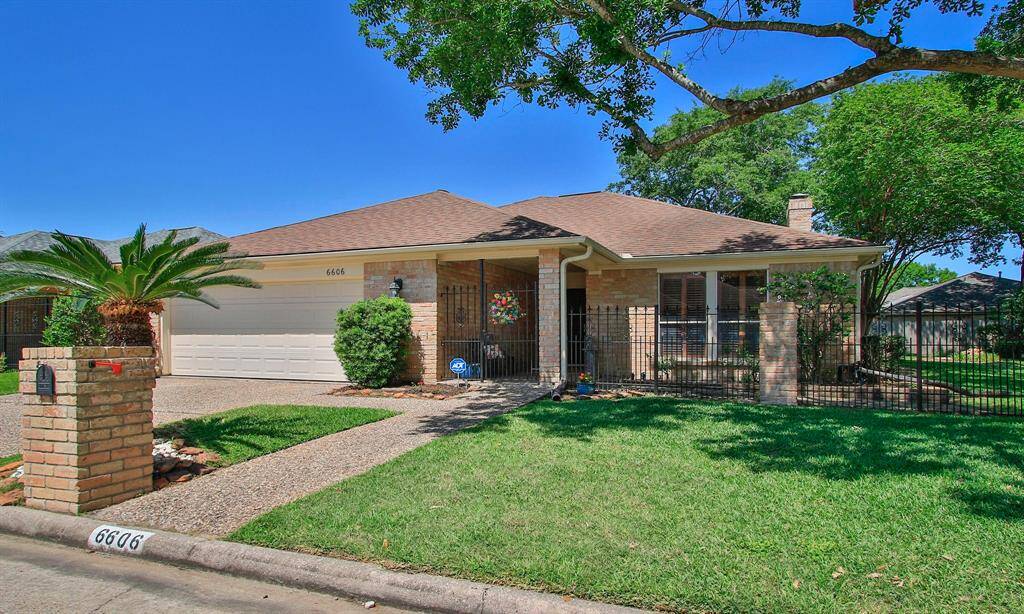 THE HOME IS SITUATED ON 1 1/2 LOTS, WITH YEAR ROUND YARD MAINTENANCE PROVIDED BY THE HOA...