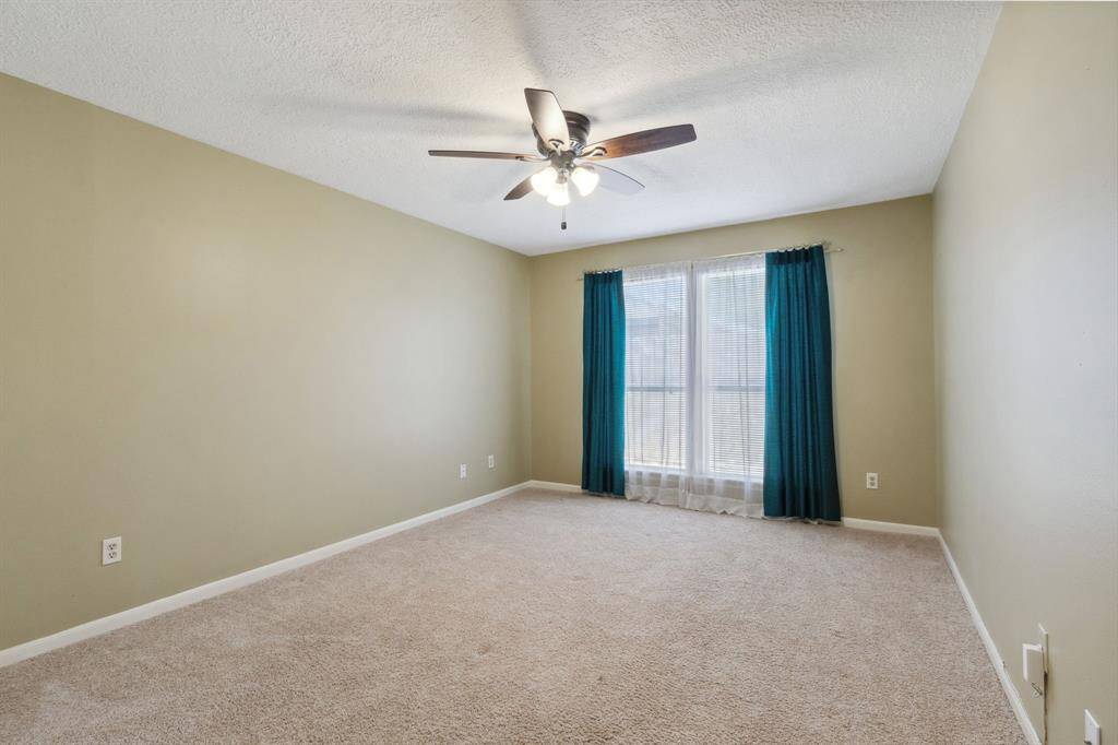 PRIVATE SPACIOUS  BACK BEDROOM (15 X 11) WITH WINDOWS OVERLOOKING BACK YARD...