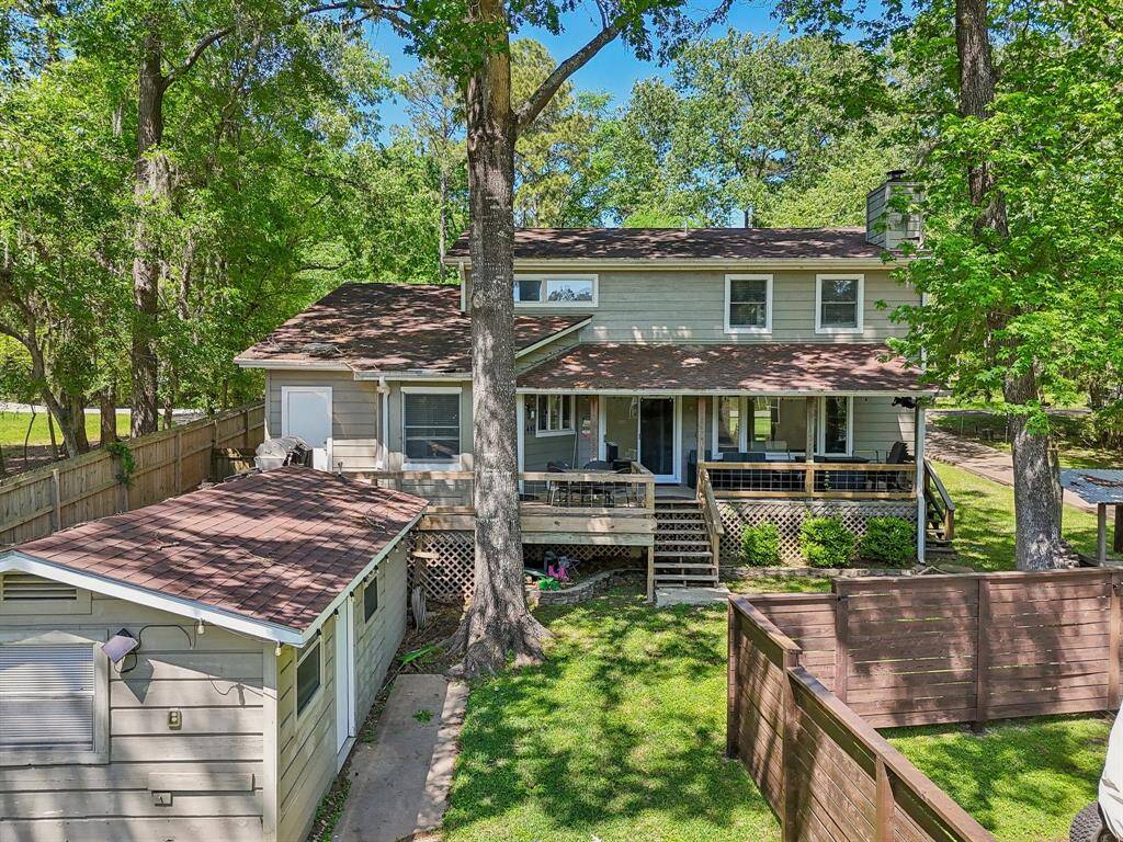 Back view of beautiful lake home.