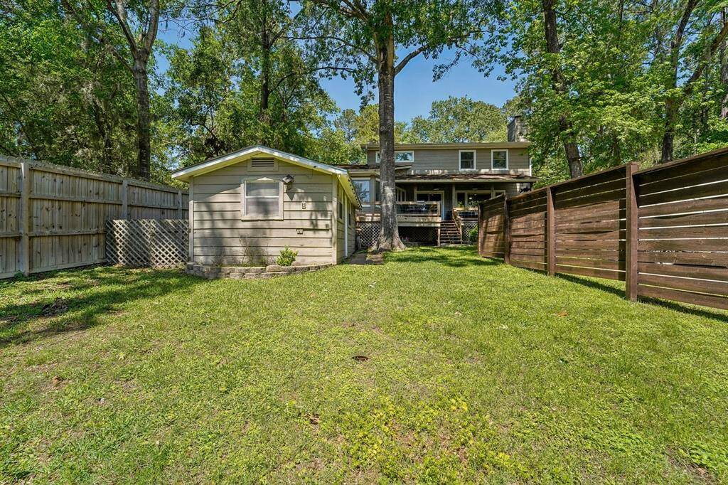 Situated on a large private lot that gently slopes down to the water, this property offers the perfect blend of privacy and lakefront access. Enjoy the convenience of direct shoreline access right from your backyard—ideal for boating, fishing, or simply soaking in the serene views.
