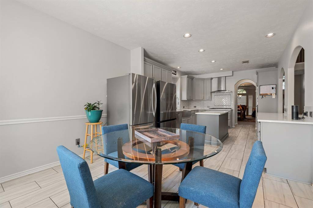 This kitchen will not disappoint! There is plenty of storage and counterspace making this kitchen every chef's dream! It opens to the family room and breakfast nook making it perfect to host any event or holiday!
