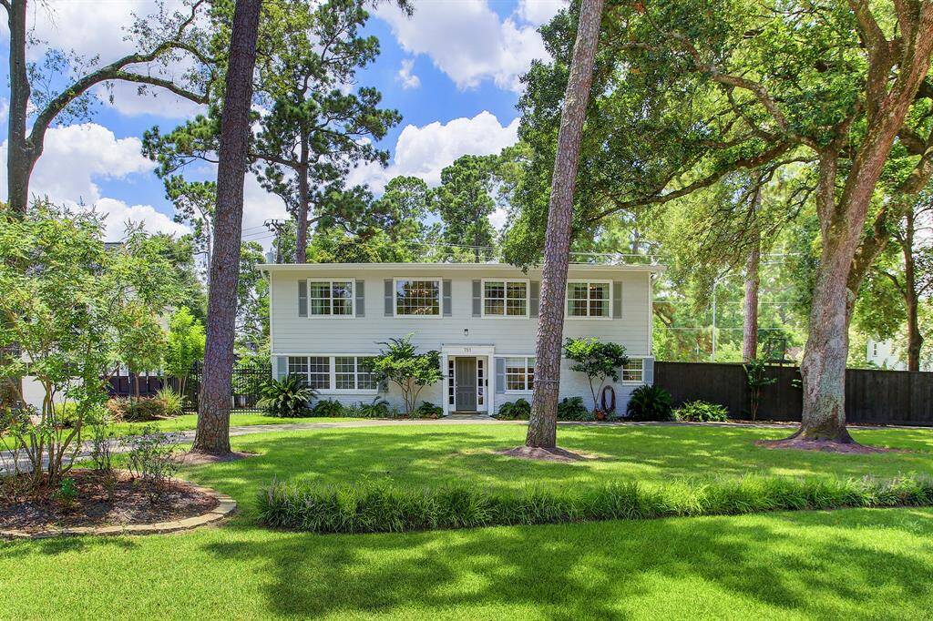 Lovely two story home in park like setting in highly desirable Garden Oaks. Beautiful corner lot with circular drive and walking distance to Garden Oaks Elementary School.