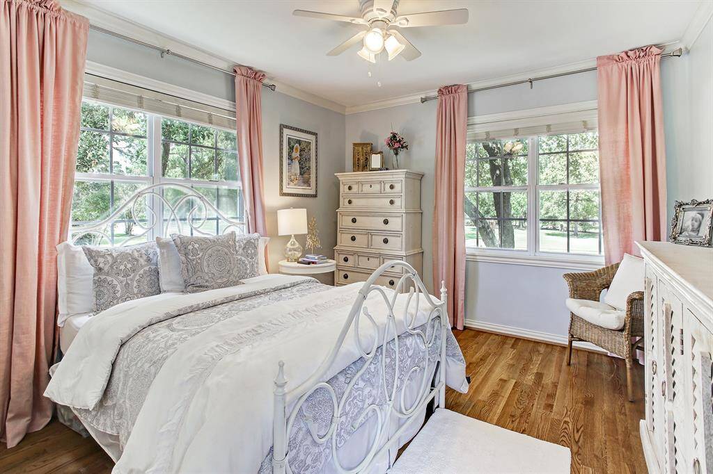 One of the three upstairs bedrooms and representative of all. Great natural light! The bedrooms are large enough for all necessary furnishings and do have good sized closets.