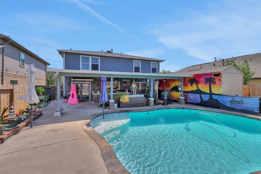 Outdoor Pool house bathroom in the far right shed!