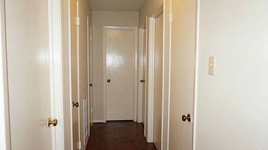 Hallway, 3 extra closets there