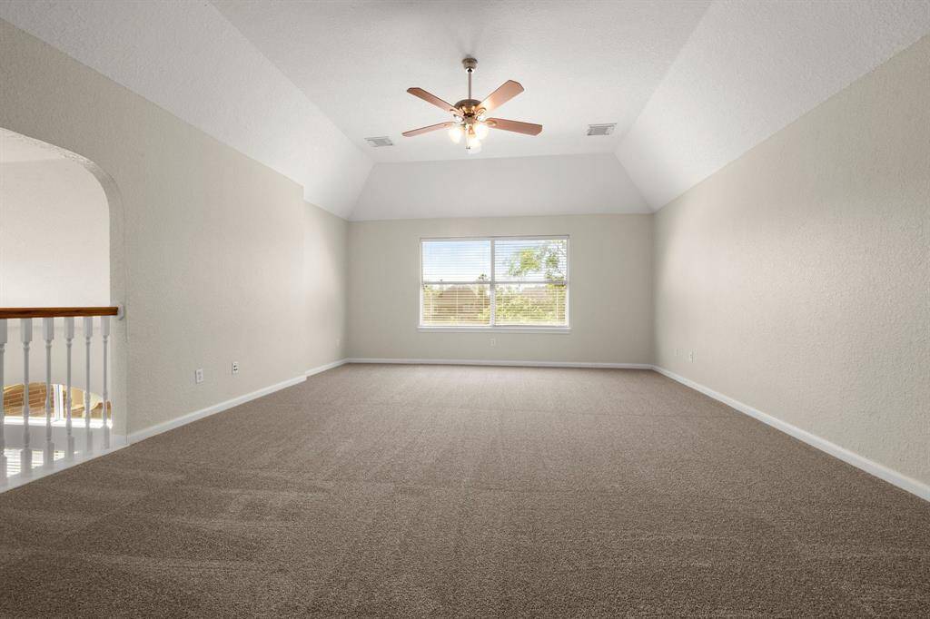 Upstairs gameroom with new carpet throughout the upstairs (2025)