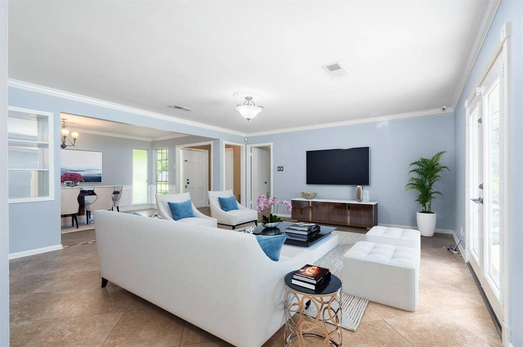 Virtually Staged: View of the living area looking back towards the front door