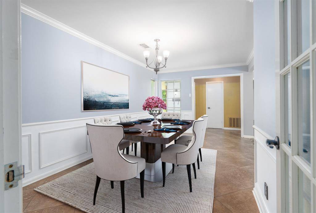Virtually Stage: Formal dining room. Could also be used as a game room or another sitting area.