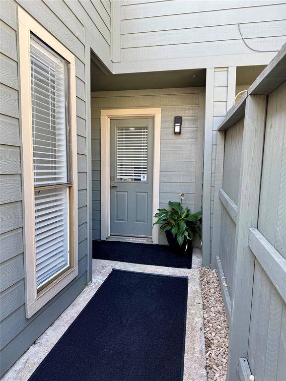 Convenient rear entry offers easy access from parking to the kitchen, perfect for groceries.
