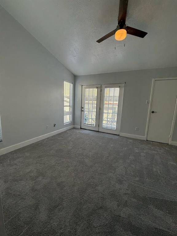Primary bedroom that the French doors go out to the patio for coffee to relax