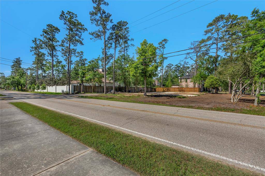 This lot sides to Knipp Road and is across from the neighborhood walking path.