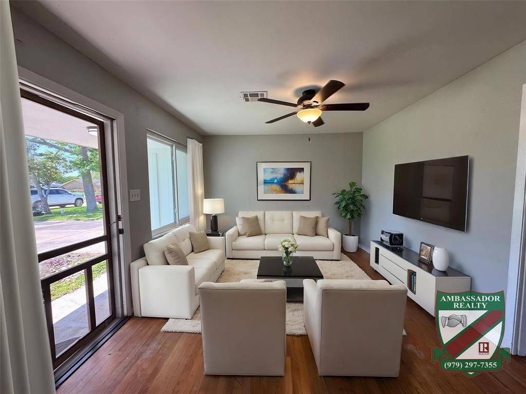 Relax in your living room after a long day. *Virtually Staged*