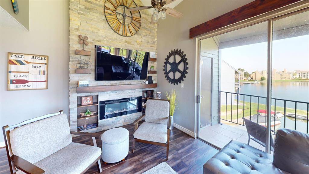 Cozy fireplace for those chilly mornings overlooking the cove and lake.
