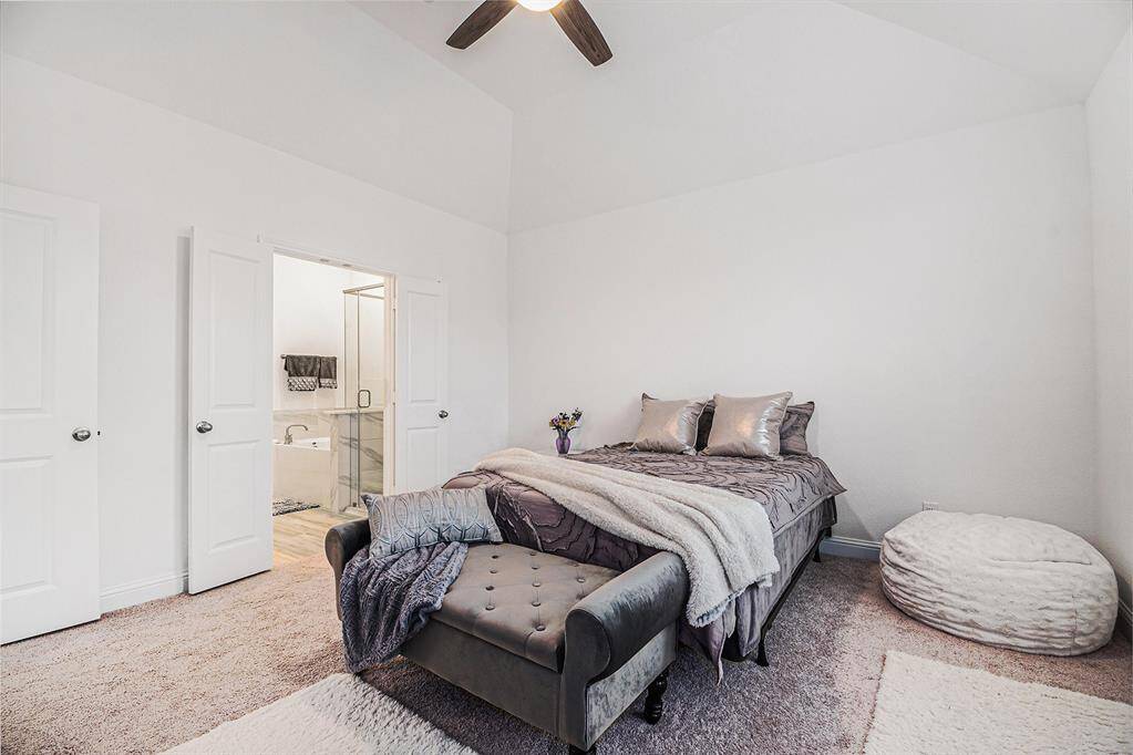 Owner's suite wraps around to ensuite bath and spacious walk-in closet
