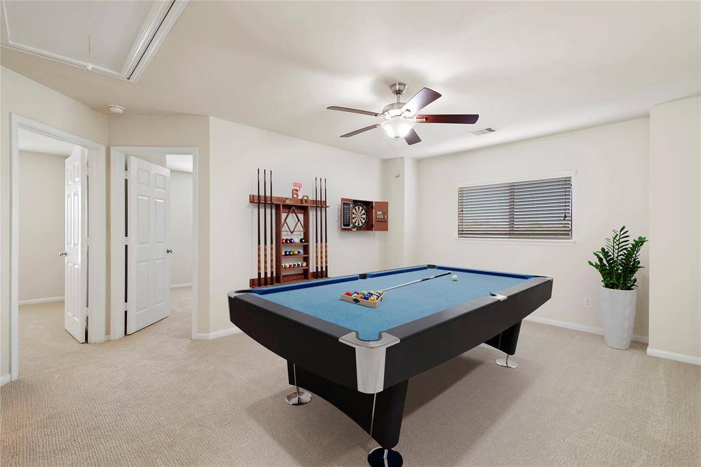 Virtual furnishing. Imagine your perfect game room in this spacious, versatile area.