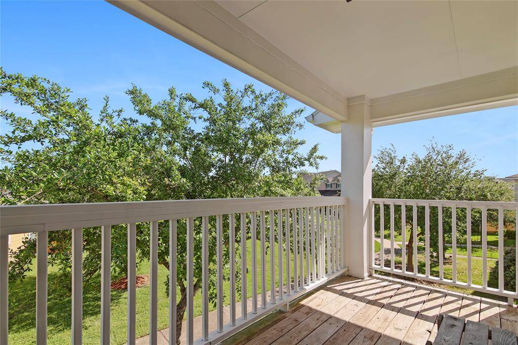 Enjoy a private retreat with this serene balcony off the primary bedroom.