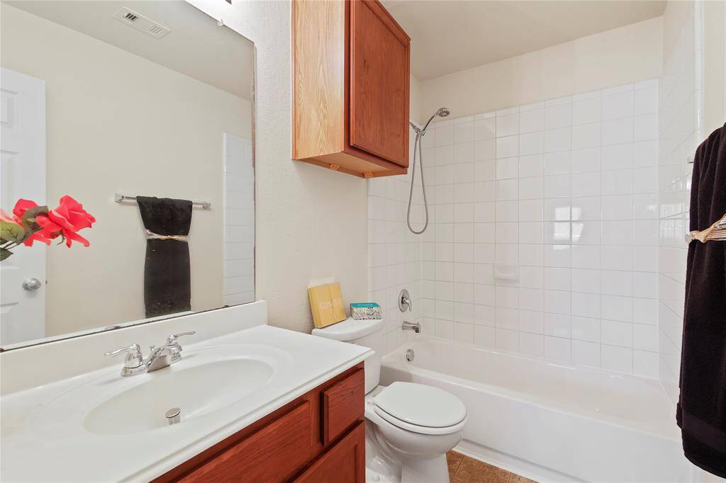 The secondary bath has a shower/tub combination.