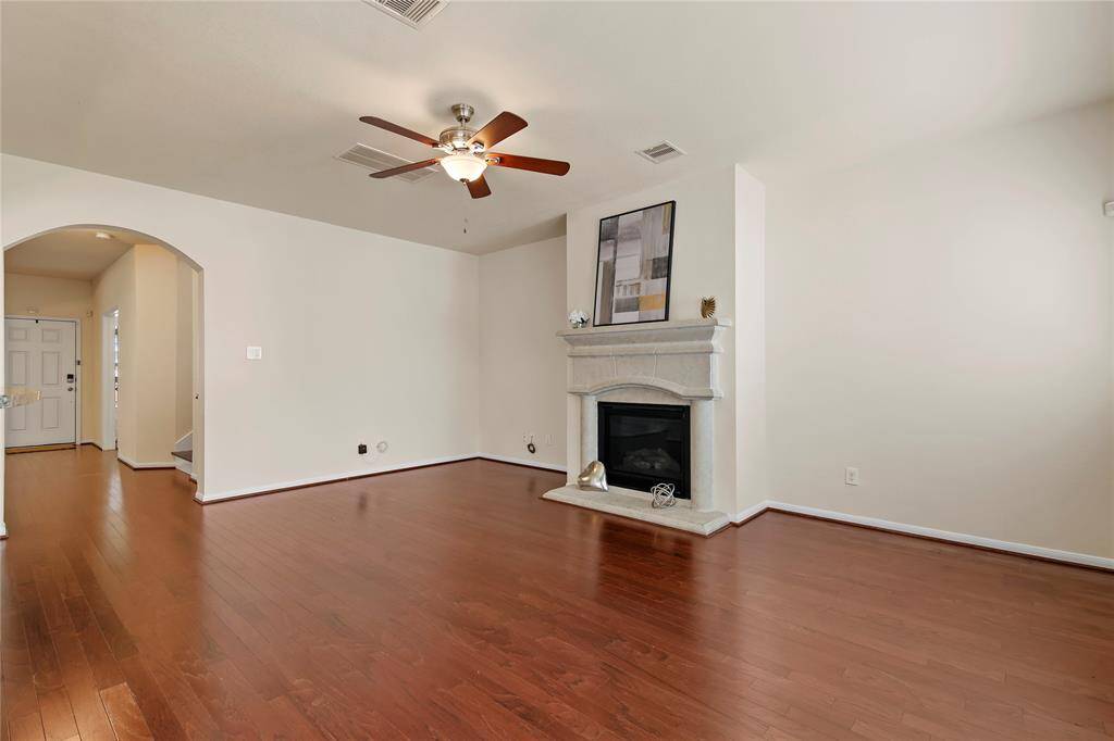 Stunning engineered wood floors enhance the entire first floor.  Arched entryways add nice touches to the space.