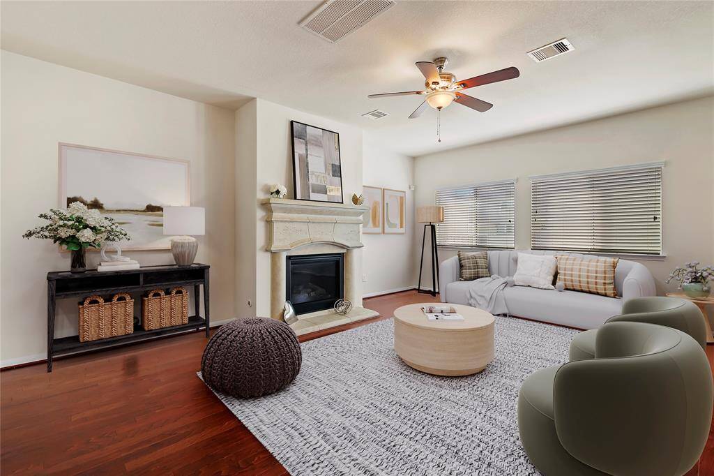 Virtual furnishing of cozy living area with a fireplace, perfect for relaxation.