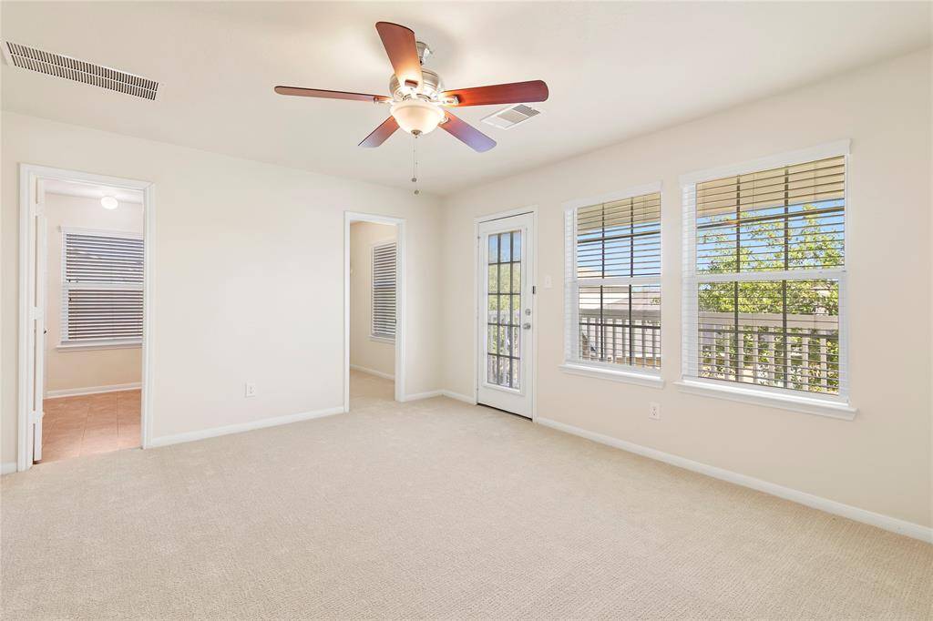 Primary bedroom is spacious, light and airy.