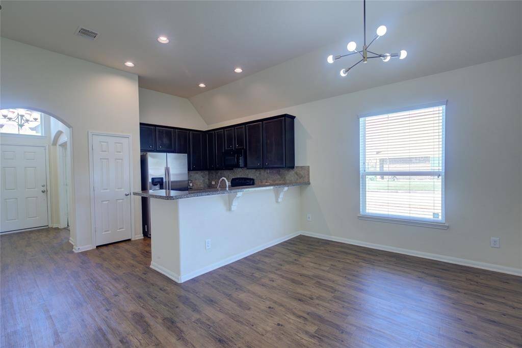 Kitchen open to living / dining