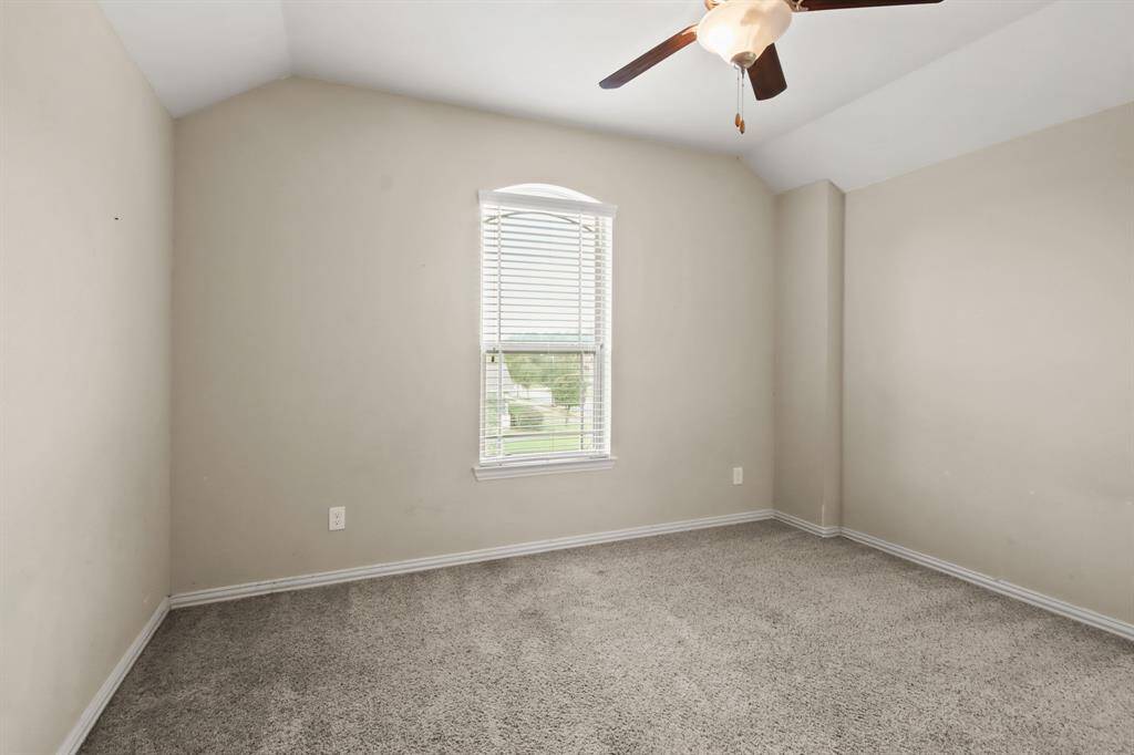 Upstairs bedrooms connected by a convenient Jack and Jill bathroom, offering privacy and shared accessibility. Each bedroom provides ample space, natural light, and cozy comfort.