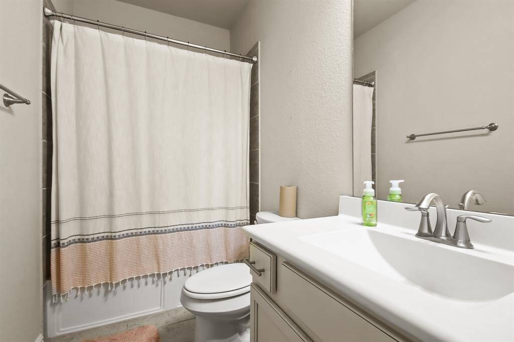 Upstairs bedrooms connected by a convenient Jack and Jill bathroom, offering privacy and shared accessibility. Each bedroom provides ample space, natural light, and cozy comfort.