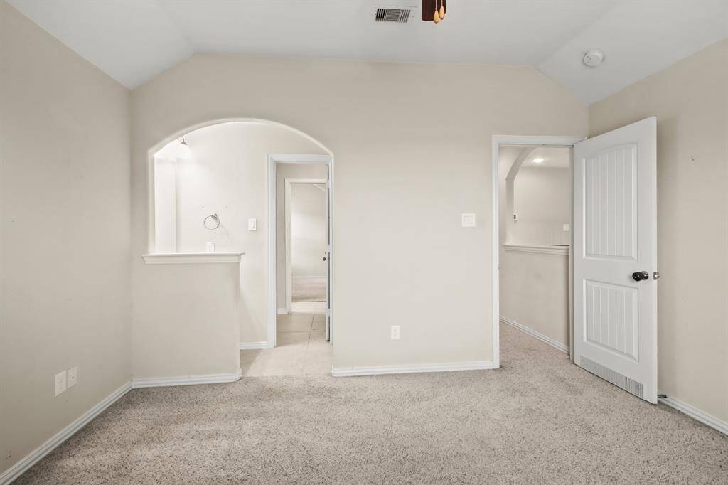 Upstairs bedrooms connected by a convenient Jack and Jill bathroom, offering privacy and shared accessibility. Each bedroom provides ample space, natural light, and cozy comfort.