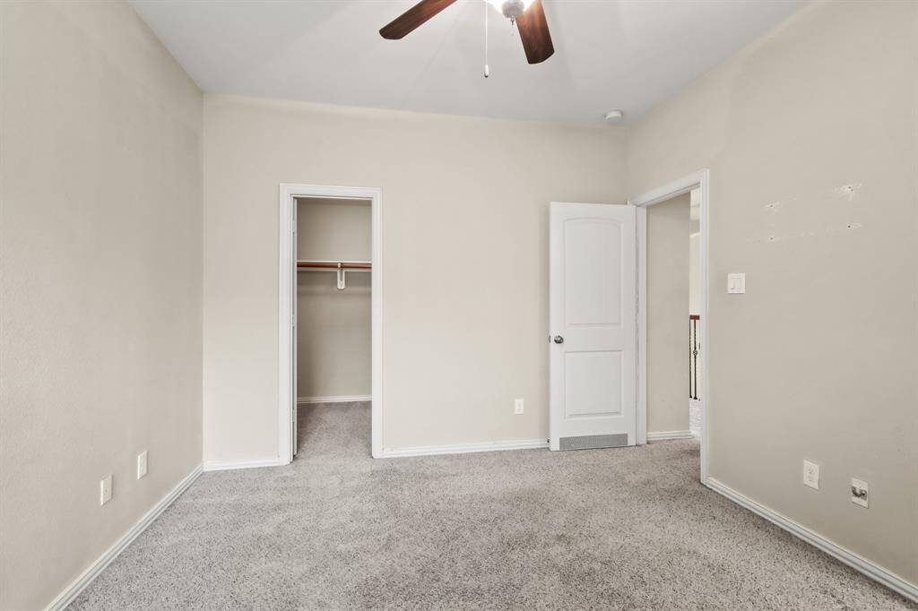 Upstairs bedrooms connected by a convenient Jack and Jill bathroom, offering privacy and shared accessibility. Each bedroom provides ample space, natural light, and cozy comfort.
