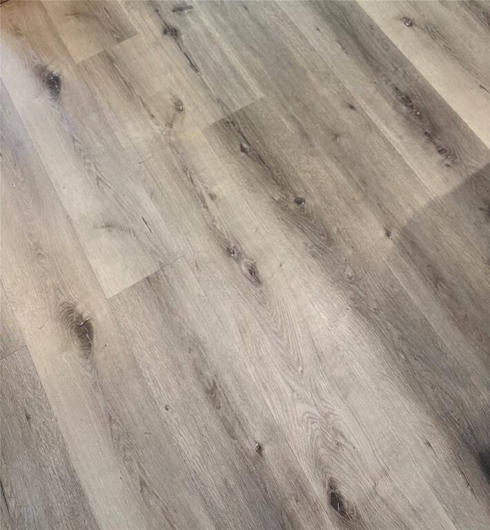Close up view of the updated flooring- this has multiple colors in the grain-