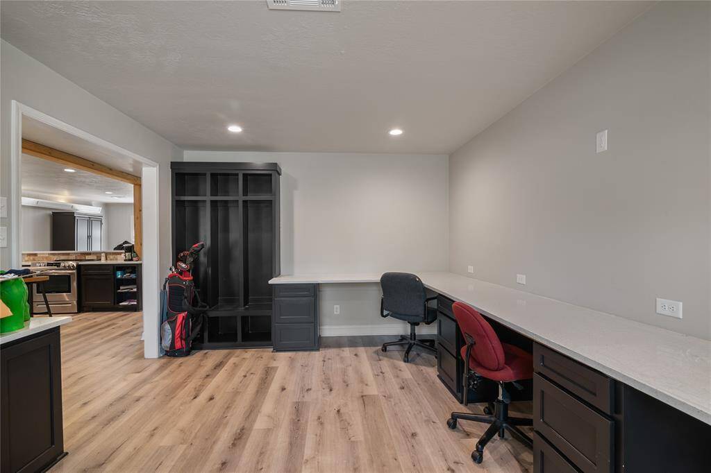 There are also some built in cabinet/cubbies for sports equipment and more-