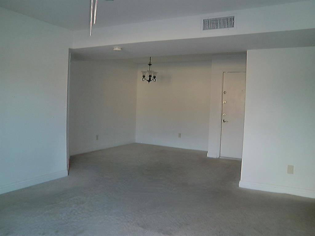 Dining area with a welcoming view of the entrance.
