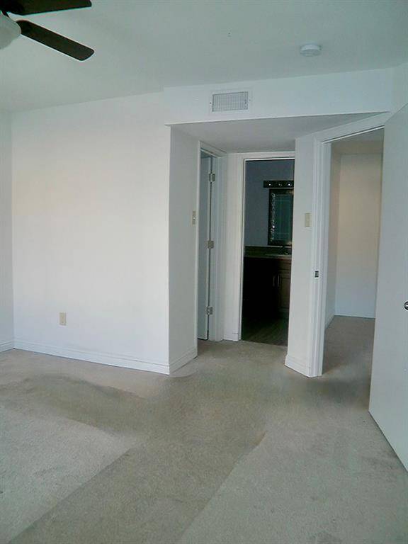 Master bath with modern fixtures and ample space for relaxation.