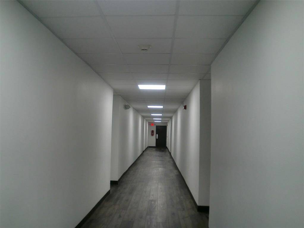 Welcoming hallway on the second floor leading to Unit #26.