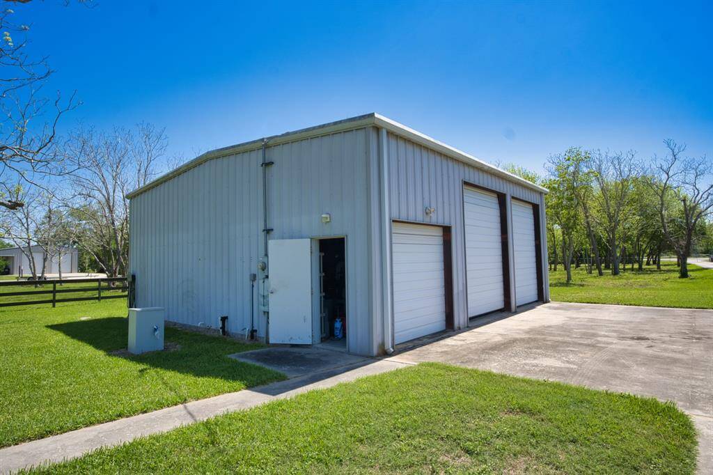 36 x 36 Shop.  Smaller door goes into an enclosed workshop area.