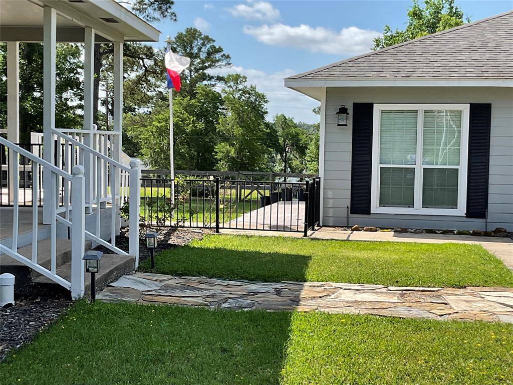 Beautiful home on 1.2 acres. Look at that porch!