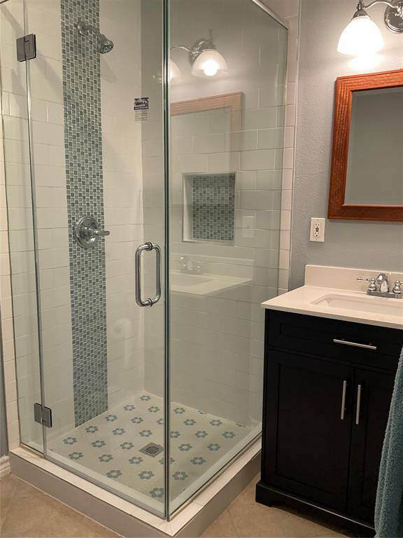 Recently Remodeled bathroom with shower and one vanity
