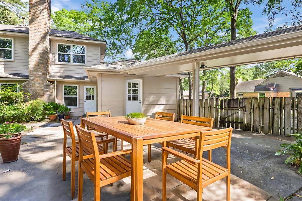 Extended back patio space. This photo has been virtually staged.