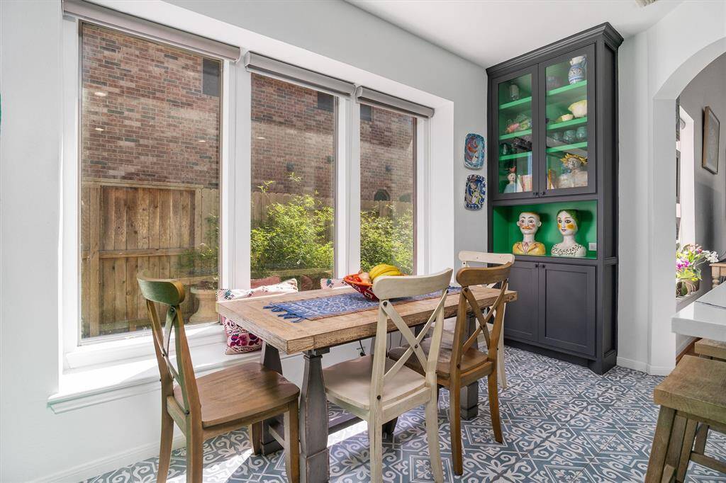 Breakfast nook with so much natural light. Lovely picture windows throughout your new home.