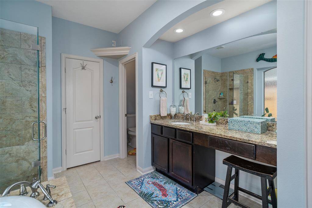 Vanity area on this side. Also his and her closets!