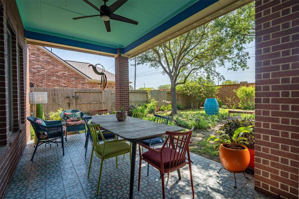 Beautiful patio outback with fresh paint and new tile flooring! NO BACK NEIGHBORS!