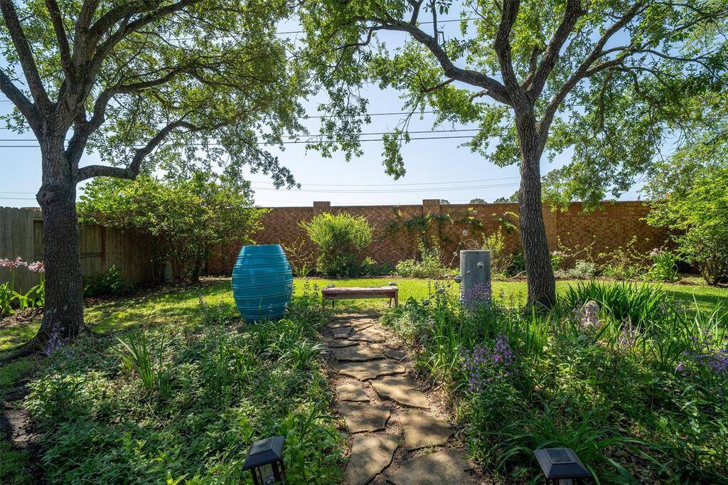 Native garden and beautiful trees for plenty of shade.