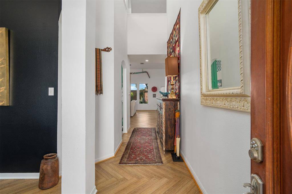 Inside you are greeted with elegance and stunning herring-bone LVP.