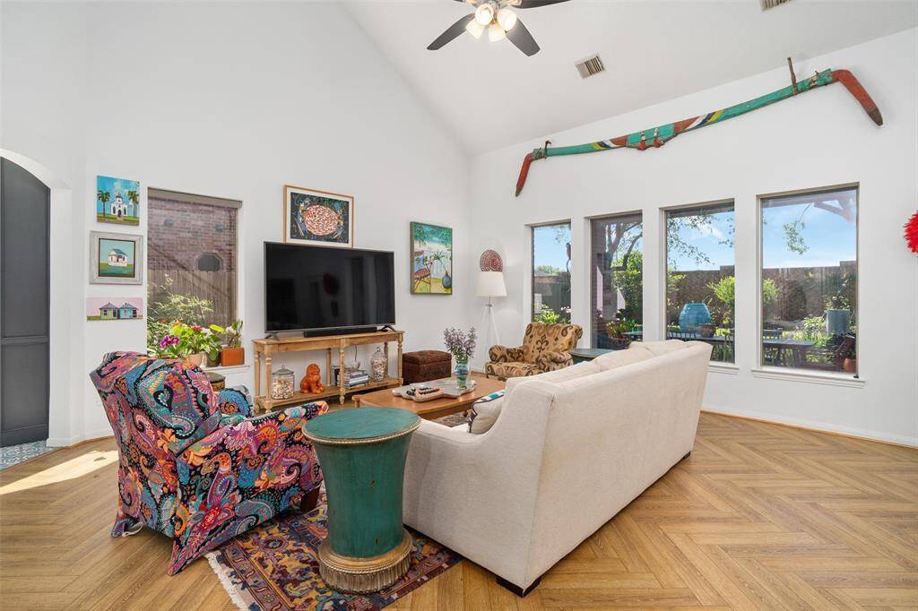 Spacious living room with plenty of space and TONS of natural light!