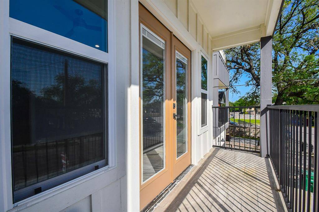 A quick step through the double doors from the primary bedroom leads to the balcony, the perfect spot to enjoy coffee on a quiet morning.