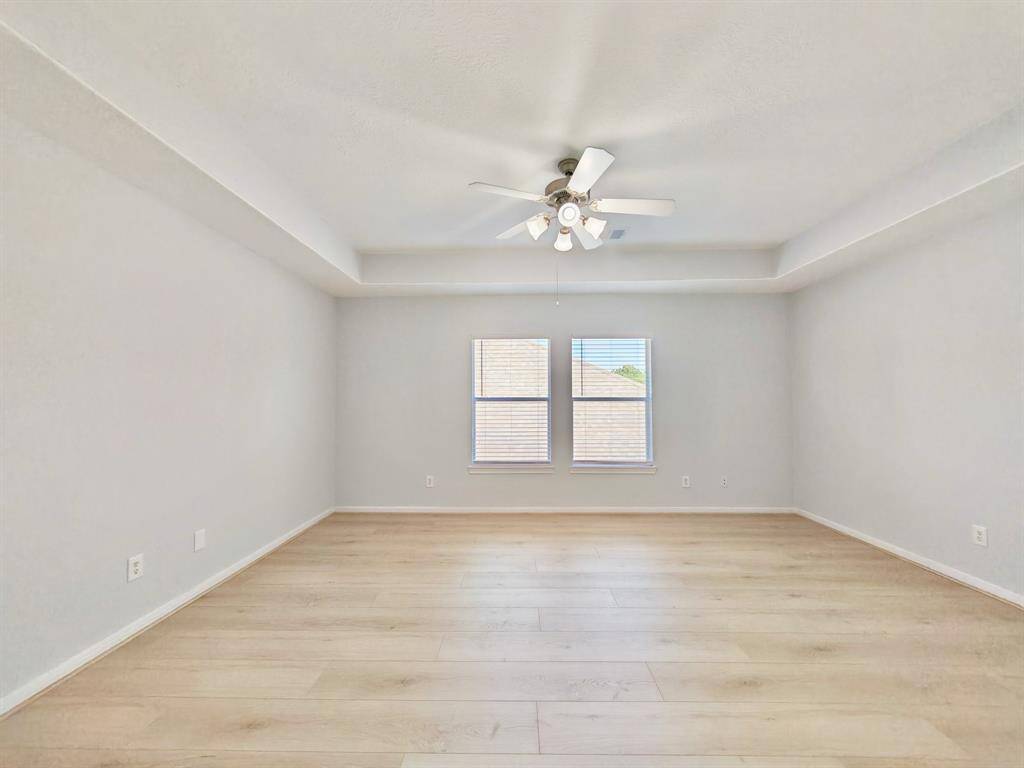 Upstairs Game room features tray ceiling
