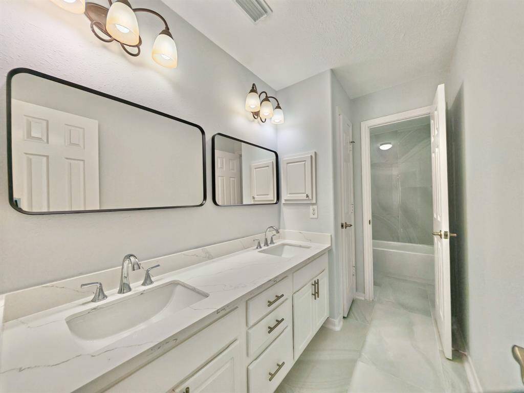 The 2nd full bathroom with double sinks