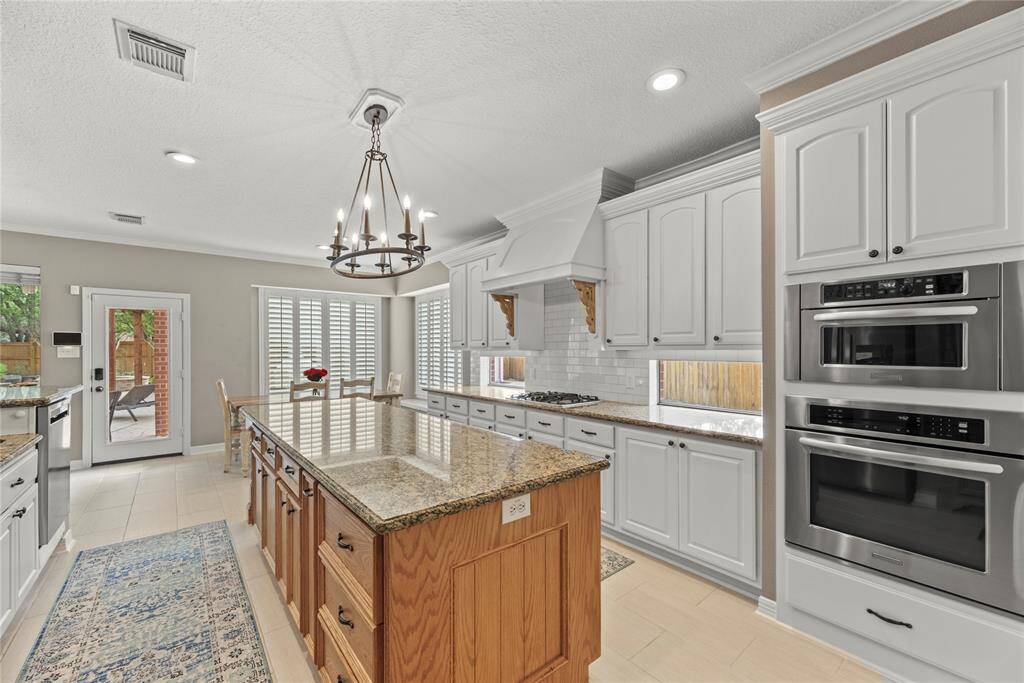 You will never run out of cabinet space in this kitchen that includes drawers, pull outs, and plenty of storage.