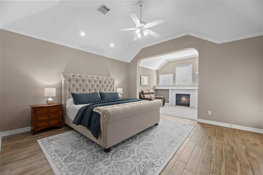 How perfect is this primary suite? Spacious and filled with natural light, this serene retreat offers the ultimate escape, promising comfort, tranquility, and pure relaxation.