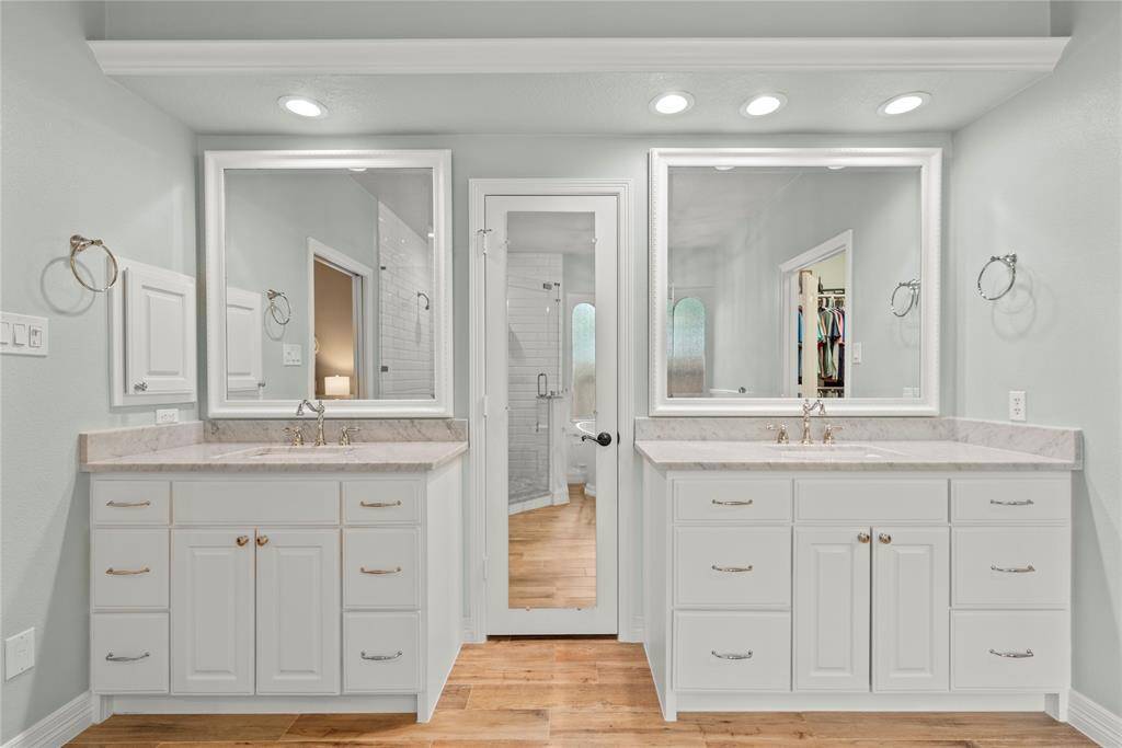 Dual vanities in your primary bath, offer personal space with tons of dedicated cabinet space.